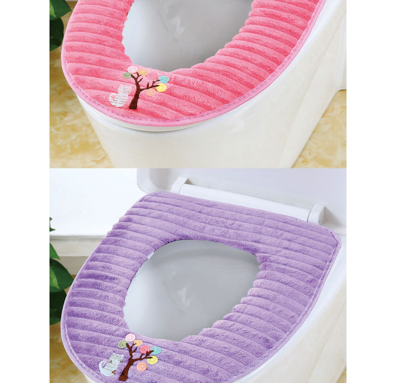 The toilet seat is sitting on the toilet seat, the toilet seat cushion the toilet seat. The toilet seat is sitting on the toilet seat, the toilet seat cushion the toilet seat.